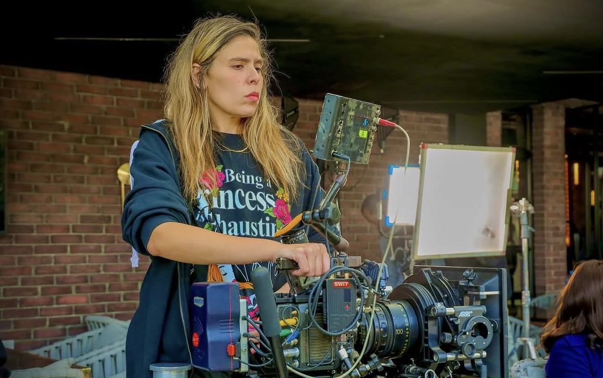 Mai Barakat commanding camera rig on exterior brick set